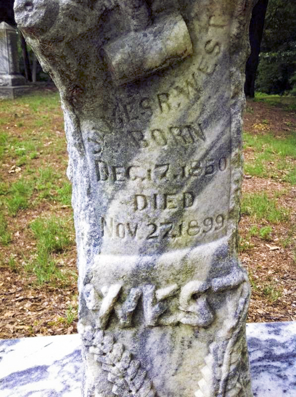 Close-up of JR's head stone J. R.'s headstone